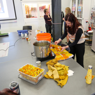 person dying materials in the dye workshop