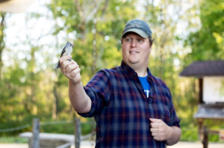 Darin “DJ” McNeil holding a bird