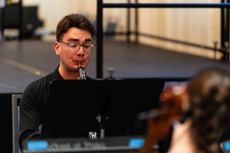 a person playing an oboe