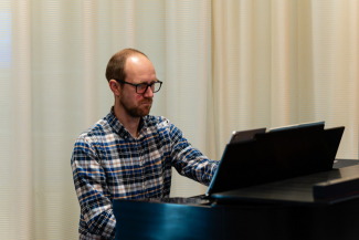 person playing a piano