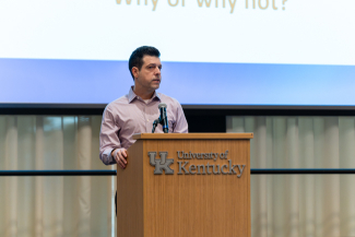 Marko Dragojevic speaks behind a University of Kentucky podium
