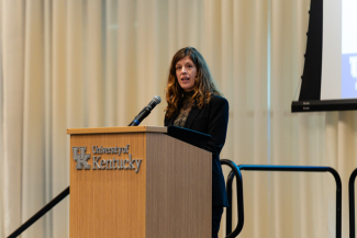  Jena Seiler speaks behind a University of Kentucky podium