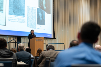 Molly Blasing speaking on stage