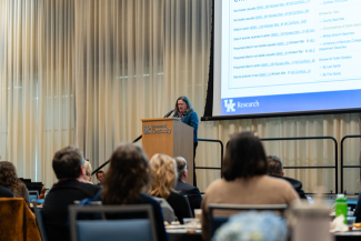 Ruth Bryan speaks on stage behind a podium