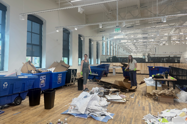 Helen Turner and Jackie Skeeters sort through recycled material in the design studio