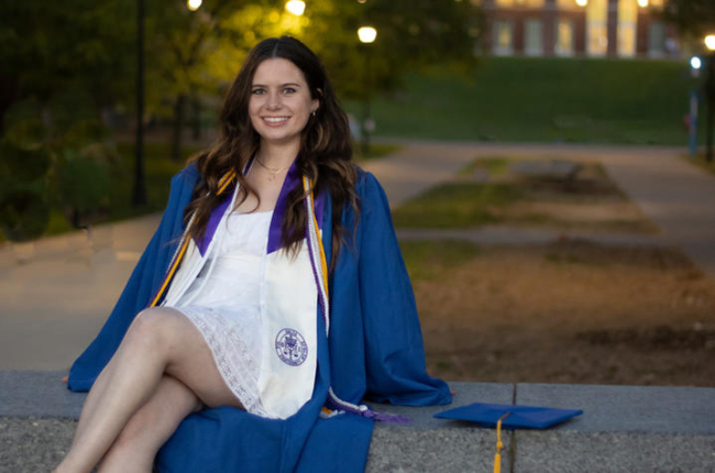 Gretchen Ruschman in UK graduation regalia