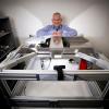 Brent Seales at a machine in his lab